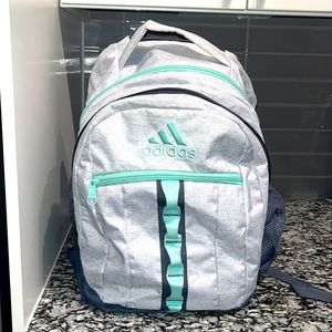 Very lightly used grey and mint adidas bag-pack practically new.